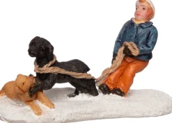 Intratuin Weihnachtsdorf Figur Kind mit spielenden Hunden 7 x 3 x 5 cm